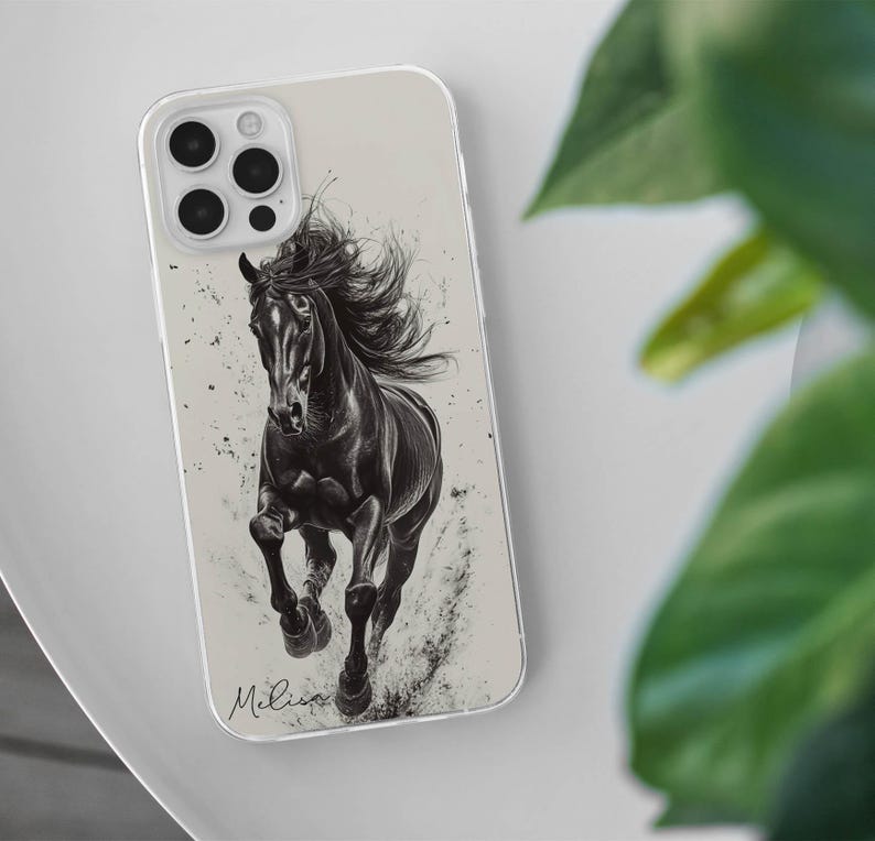 May include: A clear phone case featuring a black and white illustration of a running horse. The horse has a flowing mane and tail, with a splash effect around its hooves. The name "Melissa" is written in cursive at the bottom.