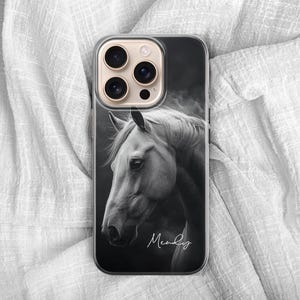 May include: A phone case featuring a black and white image of a horse's head. The horse is facing left, with its mane and face in sharp detail. The name "Mendy" is written in cursive at the bottom.