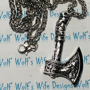 Odins axe with crow and wolf braided wheat style chain silver colored plating probably brass under Viking necklace