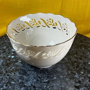 Lenox fine porcelain dish white porcelain with gold accent raised floral design beautiful rose cut outs on the rim of the dish
