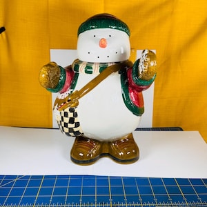 Snowman cookie jar with wings snowman angel Sukira cookie jar desing by Debbie Munn
