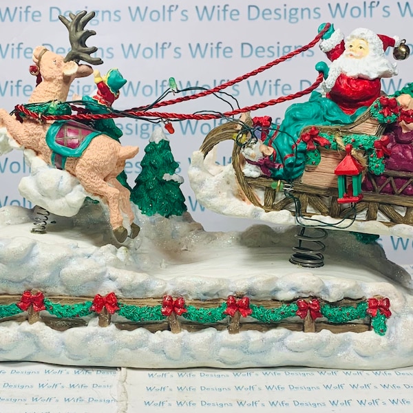 San Francisco music box company spring motion santa and sleigh reindeer Christmas musical motion light up decoration No work