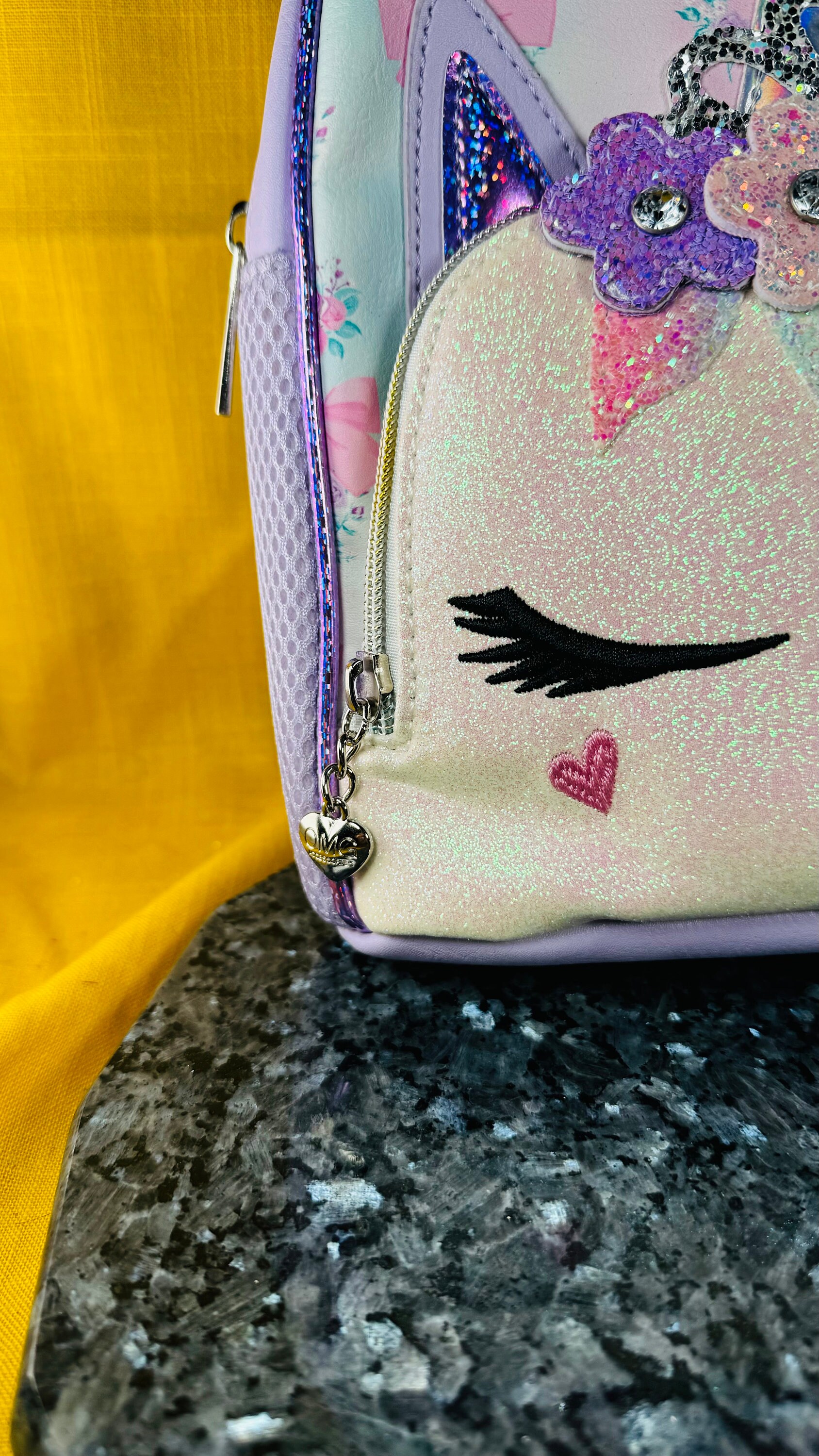 glitter unicorn mini backpack Quilted & Studded Pink Add some flair to your favorite outfit with thisbackpack that is covered with sequin Black Unicorn Backpack - Mini