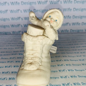 Dirty but cute little snowbaby dept. 56 snowbabies snowbaby in boot