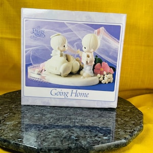enesco precious moments porcelain figurine going home #525979 in original packaging with all original paperwork