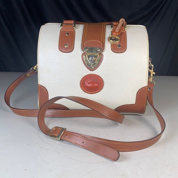 Unique vintage, Dooney and Bourke bucket or barrel/clamshell style weather resistant pebbled, leather leather inside vintage bag