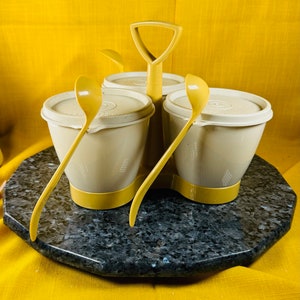 vintage tupperwear condiment holder with caddy and spoons a bit of mustard stains on the inside of one