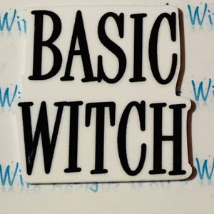 May include: White sticker with black text that reads "BASIC WITCH".