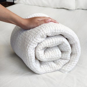 LUXURY WHITE WAFFLE towel. Soft and puffy bath linen towel in trendy waffle pattern.