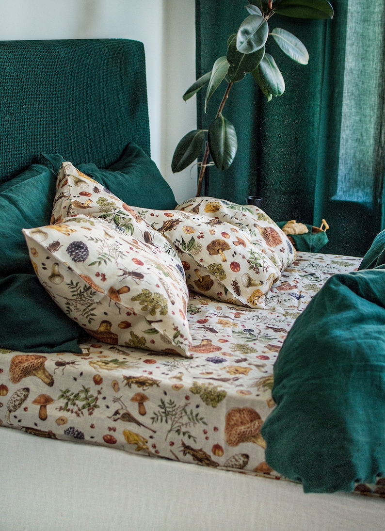 mushroom linen sheet with pair of king pillowcases paired with jungle green linen duvet and shams