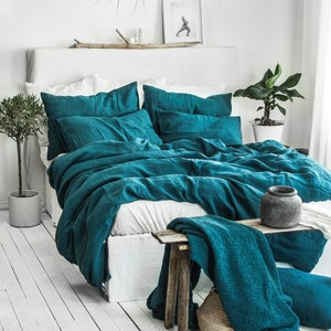 Coral and teal arrow crib bedding top