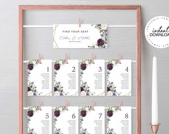 May include: A set of eight printable wedding table number cards with a floral design featuring white and purple flowers. The cards are hung on a wire rack with clothespins. The top card reads "Find Your Seat C & M".