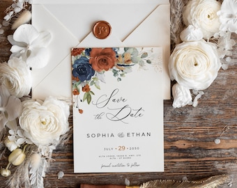 May include: Save the Date card with a watercolor floral design in shades of blue, orange, and green. The card features the text "Save the Date" in a cursive font and the names "Sophia & Ethan" below. The date "July 29, 2030" is printed below the names.