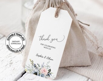 Può includere: Un'etichetta di ringraziamento bianca con un design floreale blu e rosa. L'etichetta dice "grazie per aver festeggiato con noi! Sophia & Ethan".