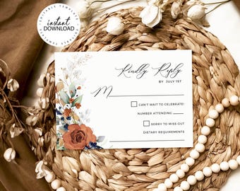 May include: A white rectangular RSVP card featuring a floral arrangement of burnt orange roses and green leaves on the left side. The text reads Kindly Reply by July 1st, M, Can't wait to celebrate, Number attending, Sorry to miss out, and Dietary requirements.