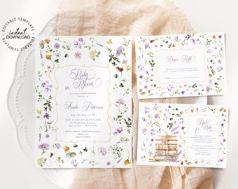 May include: A set of baby shower invitations and inserts. The main invitation features the text "Baby in Bloom" with floral accents. Additional cards include a diaper raffle and a book request, all with a floral design.