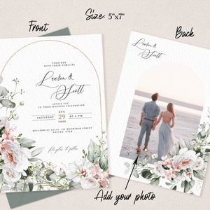 May include: A wedding invitation with a floral design in shades of pink and green. The invitation is 5 inches by 7 inches and features a gold arch with the couple's names, "Leeter & Fatt", and wedding details. The back of the invitation has a space for a photo and the couple's names.