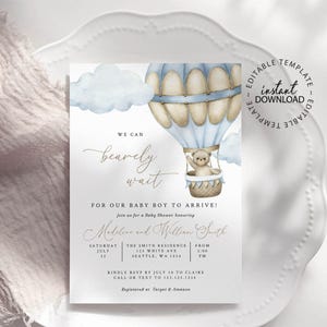 May include: A baby shower invitation with a blue and white hot air balloon with a teddy bear in the basket. The text reads "We can barely wait for our baby boy to arrive!" and includes the names "Meliline and Willian South".