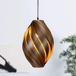 Hanging lamp made of walnut wood. Handmade, sustainable designer lamp from Cologne, Germany
