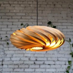 Handmade wooden lamp made of oak in 60 cm. Made in a Cologne studio.
