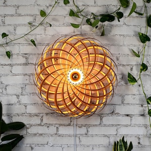 Designer wall light made of cherry wood 70 cm. Handcrafted wooden lamp from a Cologne studio.