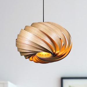 Wooden pendant lamp made of oak. Spiral-shaped slatted lamp with passive light. Handmade in Germany.