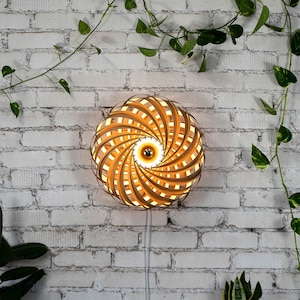 Designer wall light made of oak wood 50 cm. Handcrafted wooden lamp from a Cologne studio.