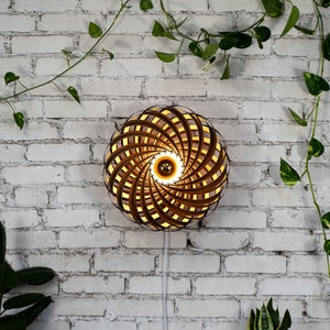 Designer wall lamp made of walnut 50 cm. Handcrafted wooden lamp from a Cologne studio.