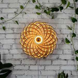 Designer wall light made of oak wood 60 cm. Handcrafted wooden lamp from a Cologne studio.