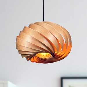 Cherry tree pendant lamp designed by Manuel Döpper with spiral-shaped and passive light. Handmade in Germany.