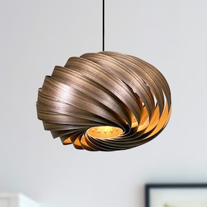 XL hanging lamp made of walnut wood. Spiral-shaped slatted lamp with passive light. Handmade in Germany.