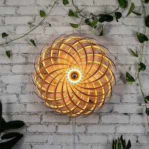 Designer wall light made of oak wood 70 cm. Handcrafted wooden lamp from a Cologne studio.