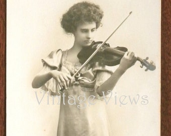 Marie Hall (1884-1956), violinist. Original real photo vintage postcard, circa early 1900s?