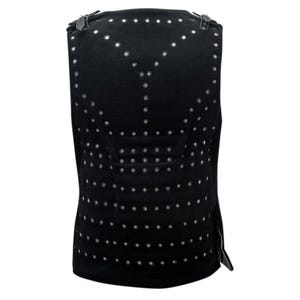 May include: Black sleeveless vest with a pattern of small silver eyelets.
