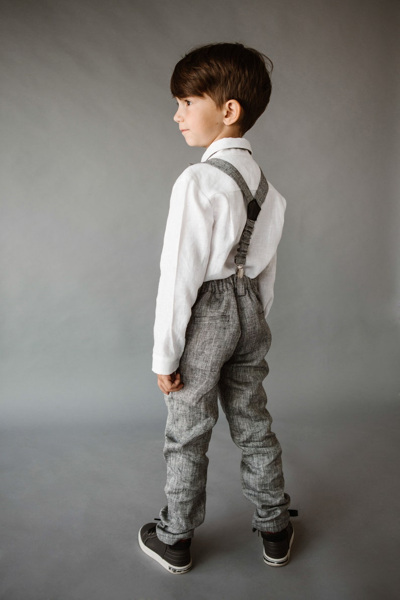 Boys linen pants with removable suspenders and bow tie, designed for formal events like weddings and baptisms. Perfect for matching father-son outfits. Available in 32 colors and sizes 2 to 15 years.