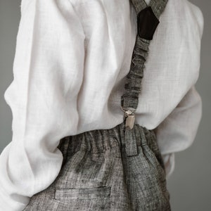 Boys linen pants with removable suspenders and bow tie, designed for formal events like weddings and baptisms. Perfect for matching father-son outfits. Available in 32 colors and sizes 2 to 15 years.