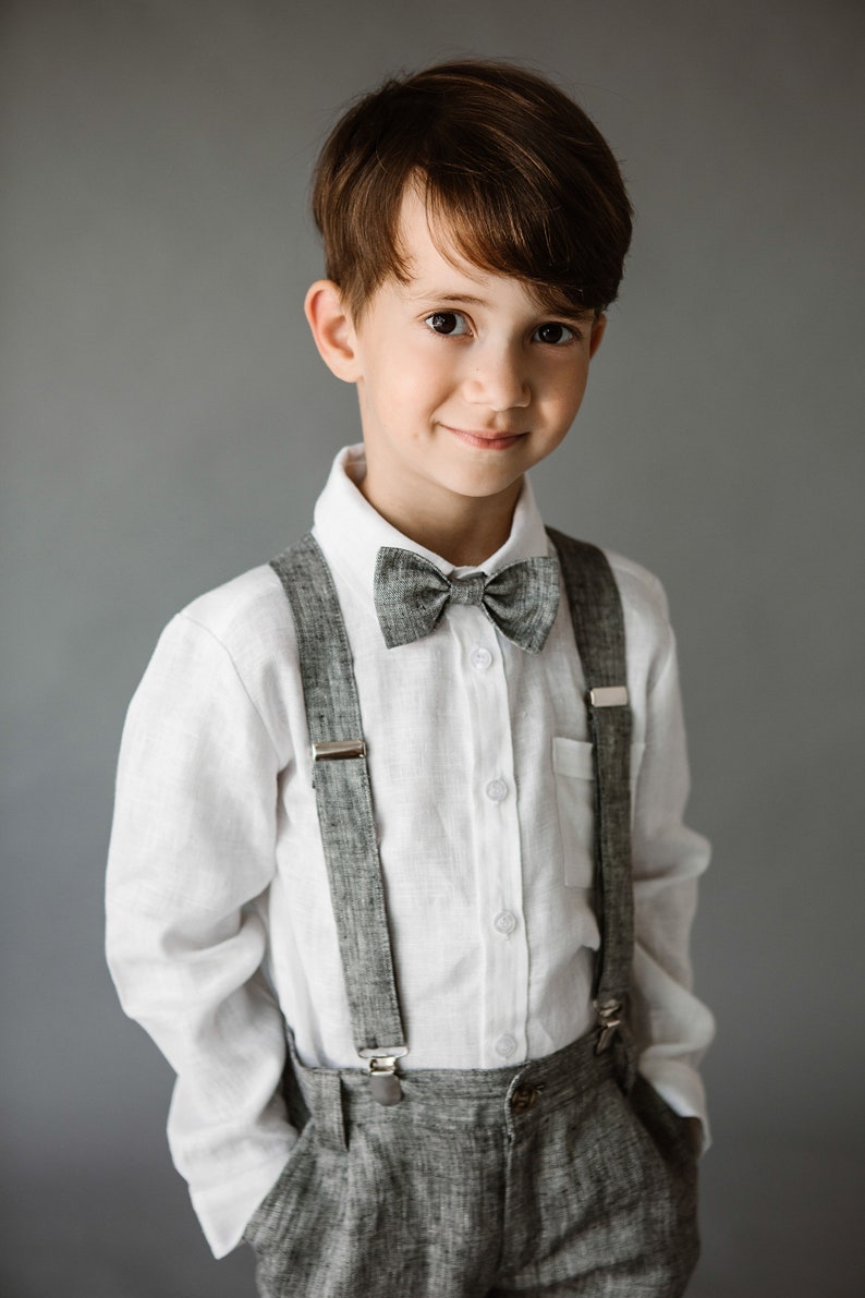 Boys linen pants with removable suspenders and bow tie, designed for formal events like weddings and baptisms. Perfect for matching father-son outfits. Available in 32 colors and sizes 2 to 15 years.