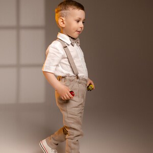 Boys linen pants with removable suspenders and bow tie, designed for formal events like weddings and baptisms. Perfect for matching father-son outfits. Available in 32 colors and sizes 2 to 15 years.