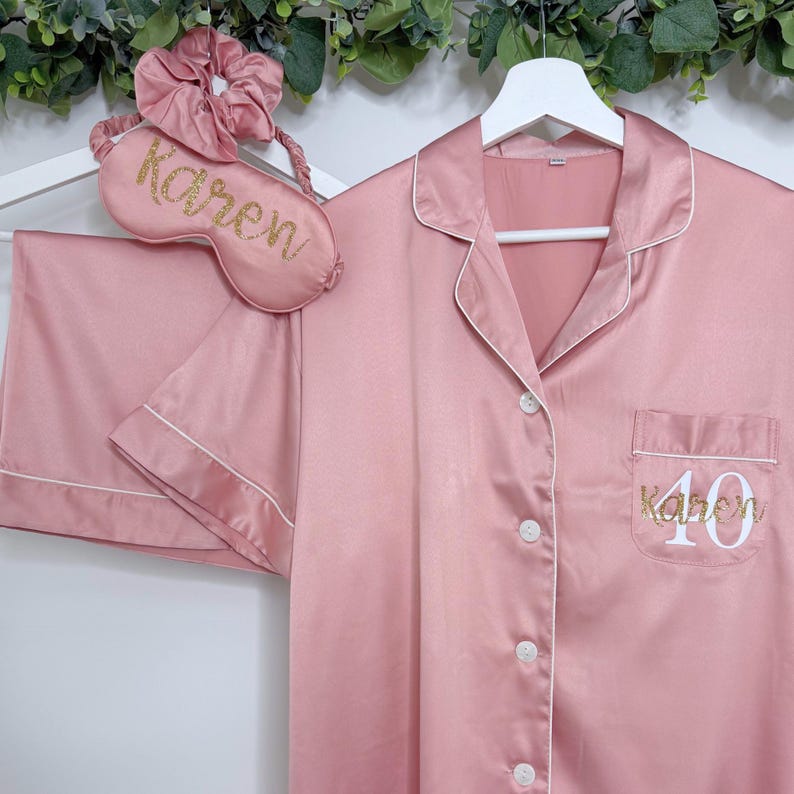 Dusty Pink coloured milestone birthday pyjamas printed for a 40th birthday with both age and name on the pocket complete with matching sleep mask and scrunchie, a truly beautiful luxury set.