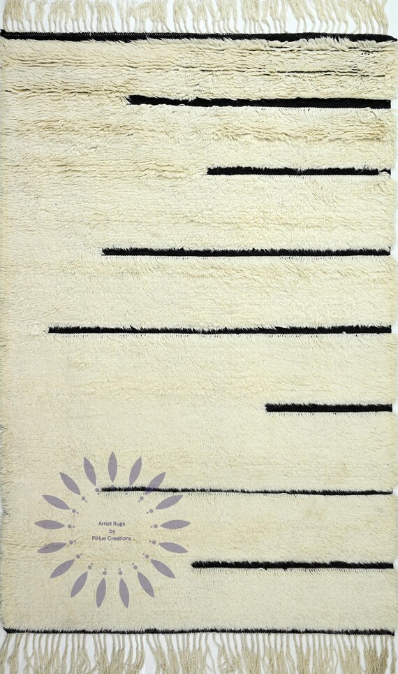 Genuine Berber unique horizontal stripe design in earthy. Perfect for infusing a touch of rustic elegance into any room.
