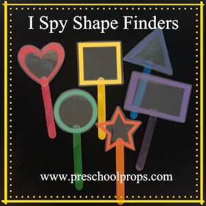 May include: A set of shape finders in various colours, including a heart, circle, square, triangle, rectangle, and star. Each finder has a clear window and a coloured handle. The text "I Spy Shape Finders" and a website address are visible.