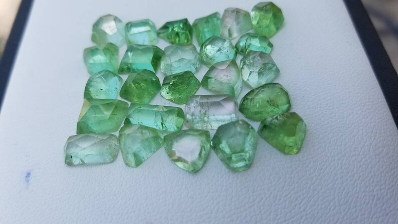 51.50 carats green tourmaline rosecuts