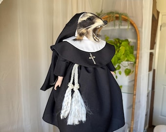 PRE ORDER angry raccoon nun doll *CAPTION
