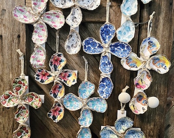 Hanging oyster shell cross