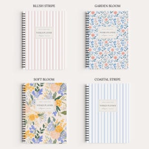 May include: Four spiral-bound weekly planners with distinct covers: Blush Stripe with pink vertical lines, Garden Bloom with blue and peach floral patterns, Soft Bloom with yellow and blue flowers, and Coastal Stripe with light blue vertical lines.