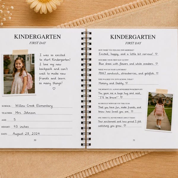 May include: A spiral-bound Kindergarten First Day memory book with white pages, black text, and two printed photographs of a child. The left page includes fields for school, teacher, age, height of 43 inches, and date, while the right page has prompts.