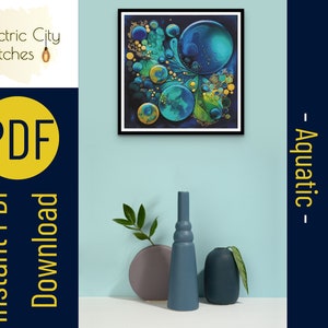 May include: A digital cross stitch pattern featuring a colorful abstract design with blue, green, and gold circles on a dark background. The pattern is titled "Aquatic" and is available as an instant PDF download.
