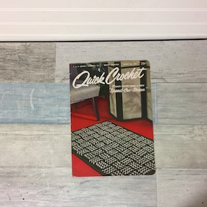 May include: A vintage "Quick Crochet" booklet with a retro cover design. The cover features a black and white rug, a mid-century modern chair, and a room divider on a red background. The booklet is titled "Quick Crochet" and includes the text "21 Easy-to-Do Items in New 'Speed-Cro-Sheen'."