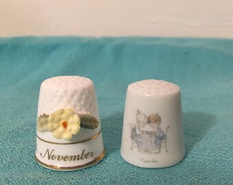 Precious Moments Baby In Crib with Yellow Birdy blanky Fine Bone China thimble 