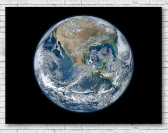 May include: A blue and green globe of Earth with North America centered in the image. The globe is surrounded by a black background.